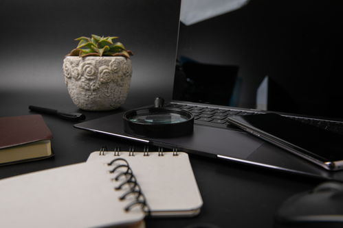 放大鏡便簽本辦公用品商務(wù)攝影圖 攝影